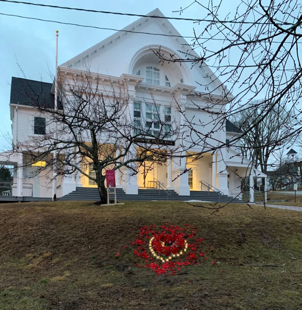Blue Hill Town Hall with COVID heart flowers